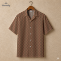 Men’s geometric-pattern cotton Hawaiian short-sleeve button-down shirt in black, gold and pink.
