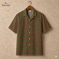 Men’s geometric-pattern cotton Hawaiian short-sleeve button-down shirt in black, brown and yellow.
