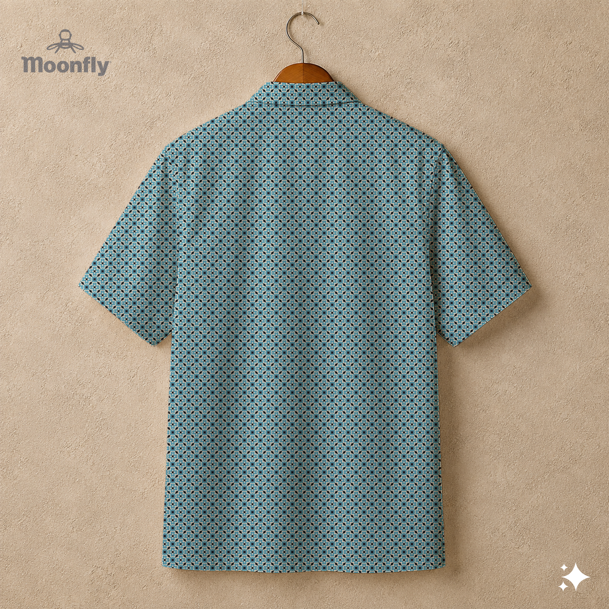 Back view of a men’s geometric-pattern cotton Hawaiian short-sleeve button-down shirt in black, blue and cream.