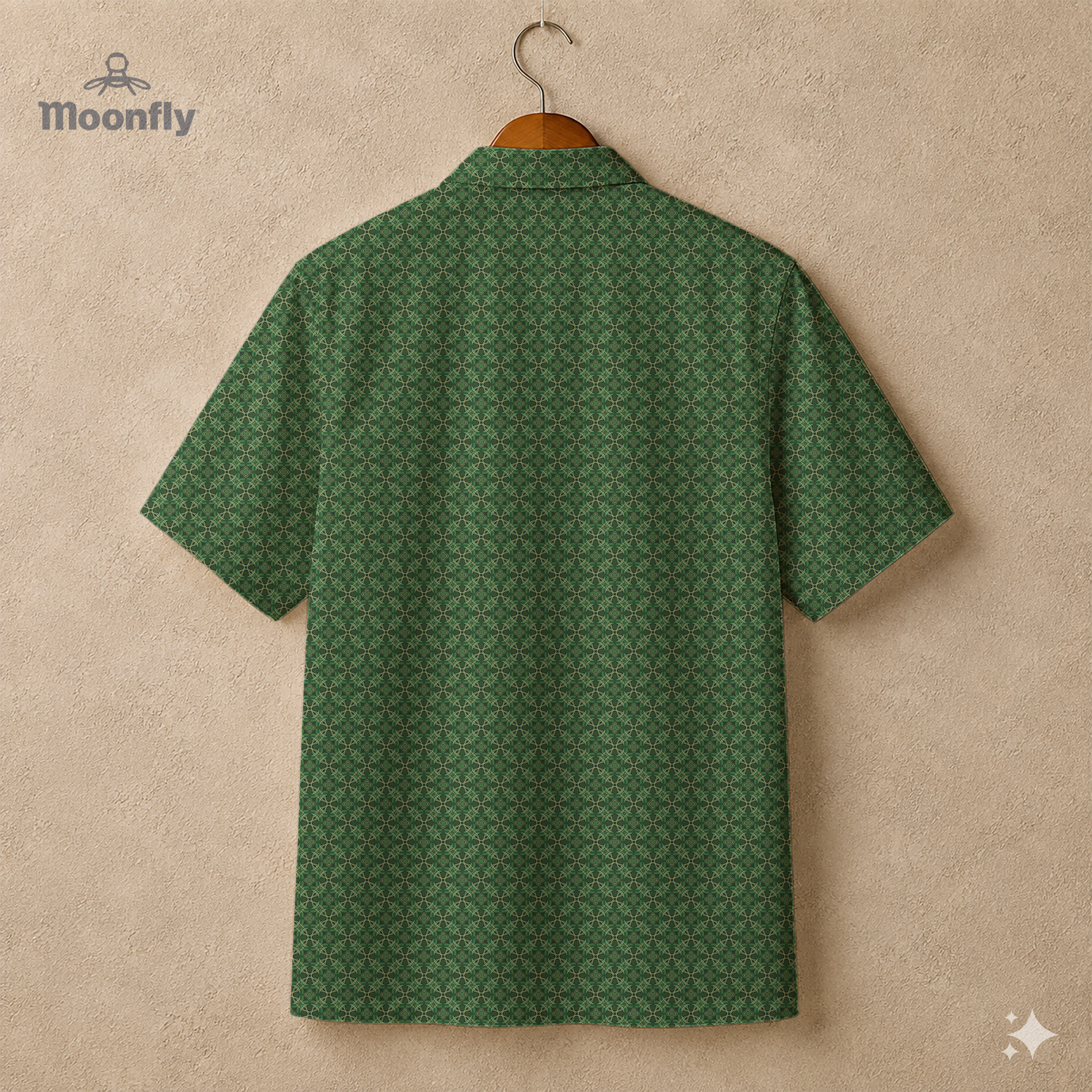Back view of a men’s geometric-pattern cotton Hawaiian short-sleeve button-down shirt in dark green, light green and cream.