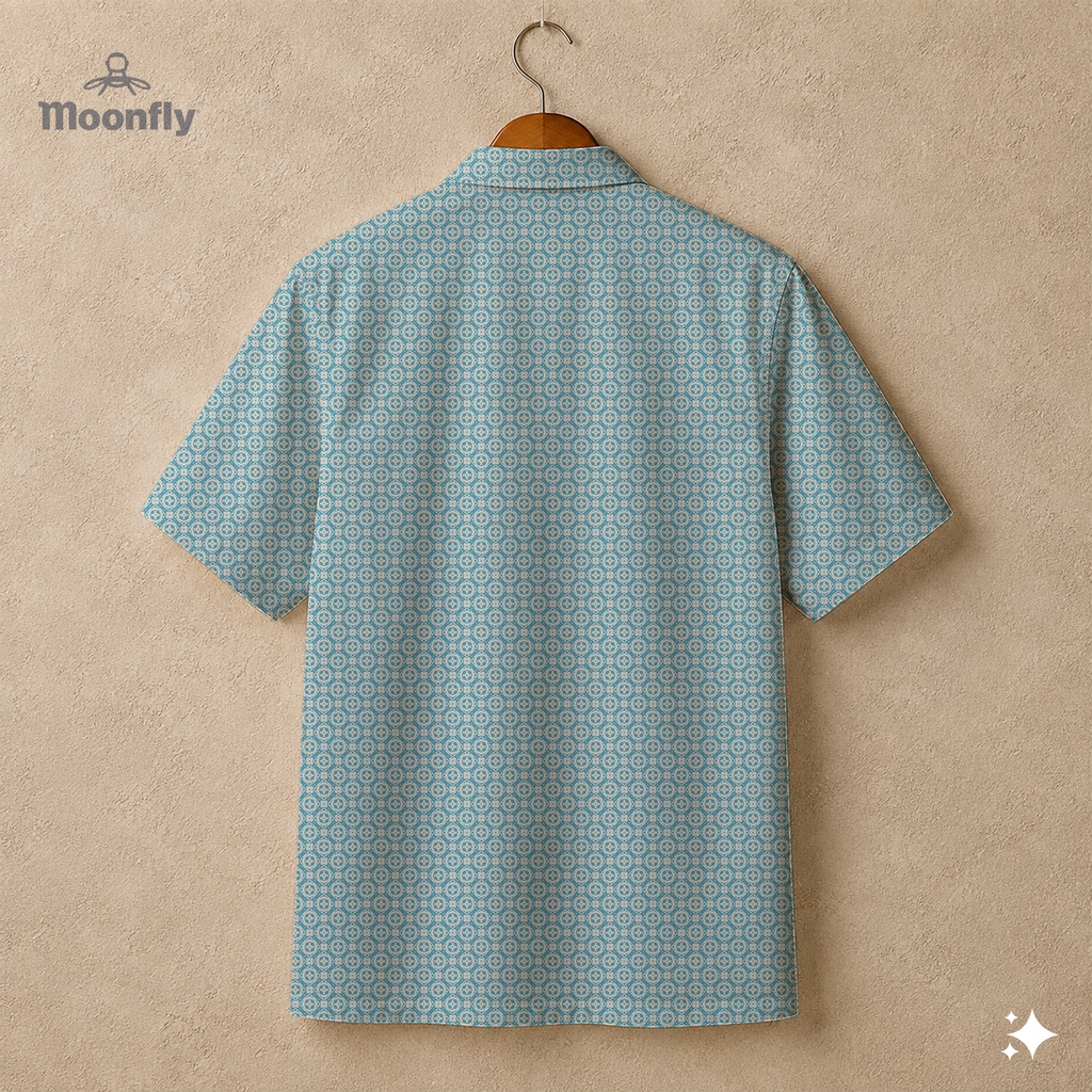 Back view of a men’s geometric-pattern cotton Hawaiian short-sleeve button-down shirt in cream and light blue.