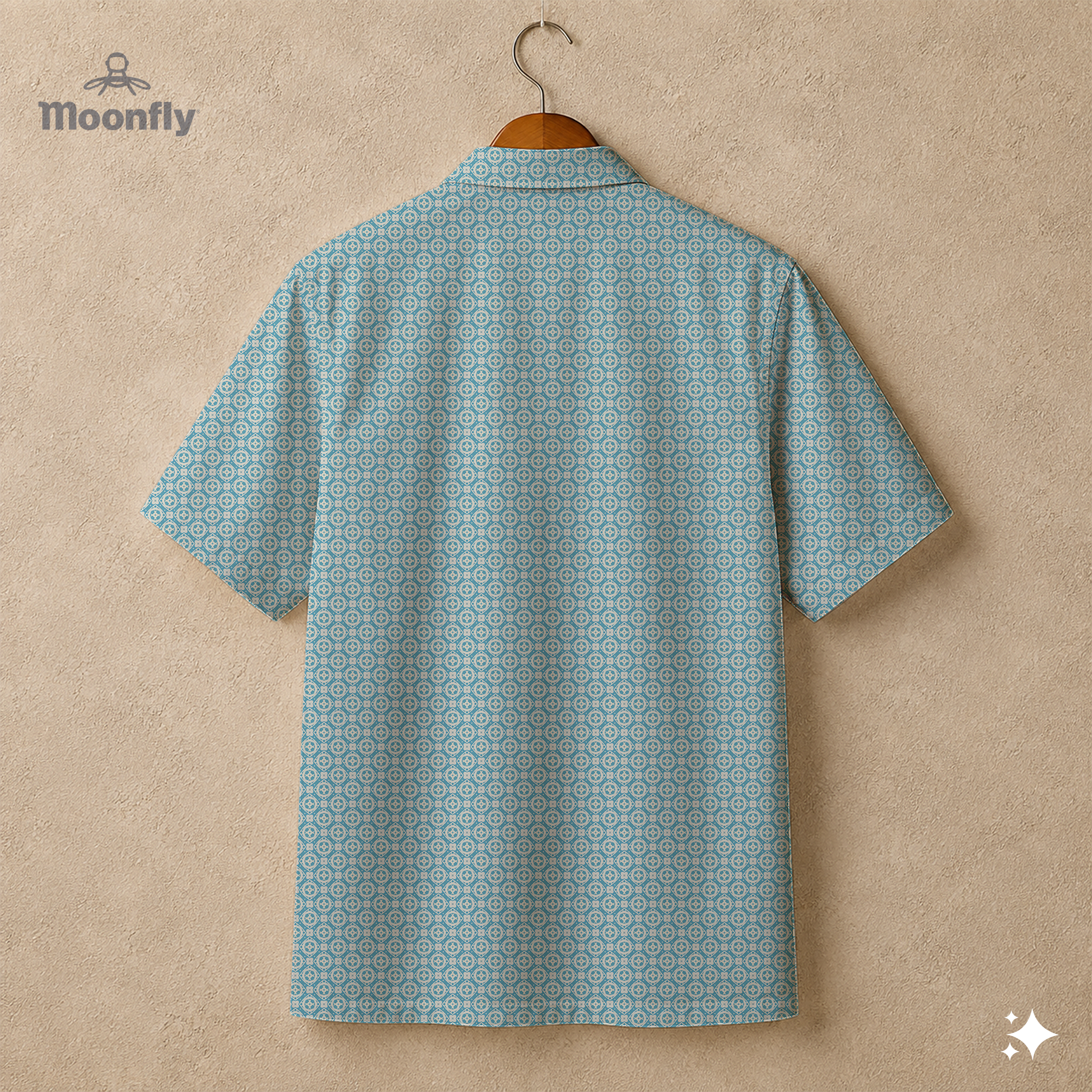 Back view of a men’s geometric-pattern cotton Hawaiian short-sleeve button-down shirt in cream and light blue.