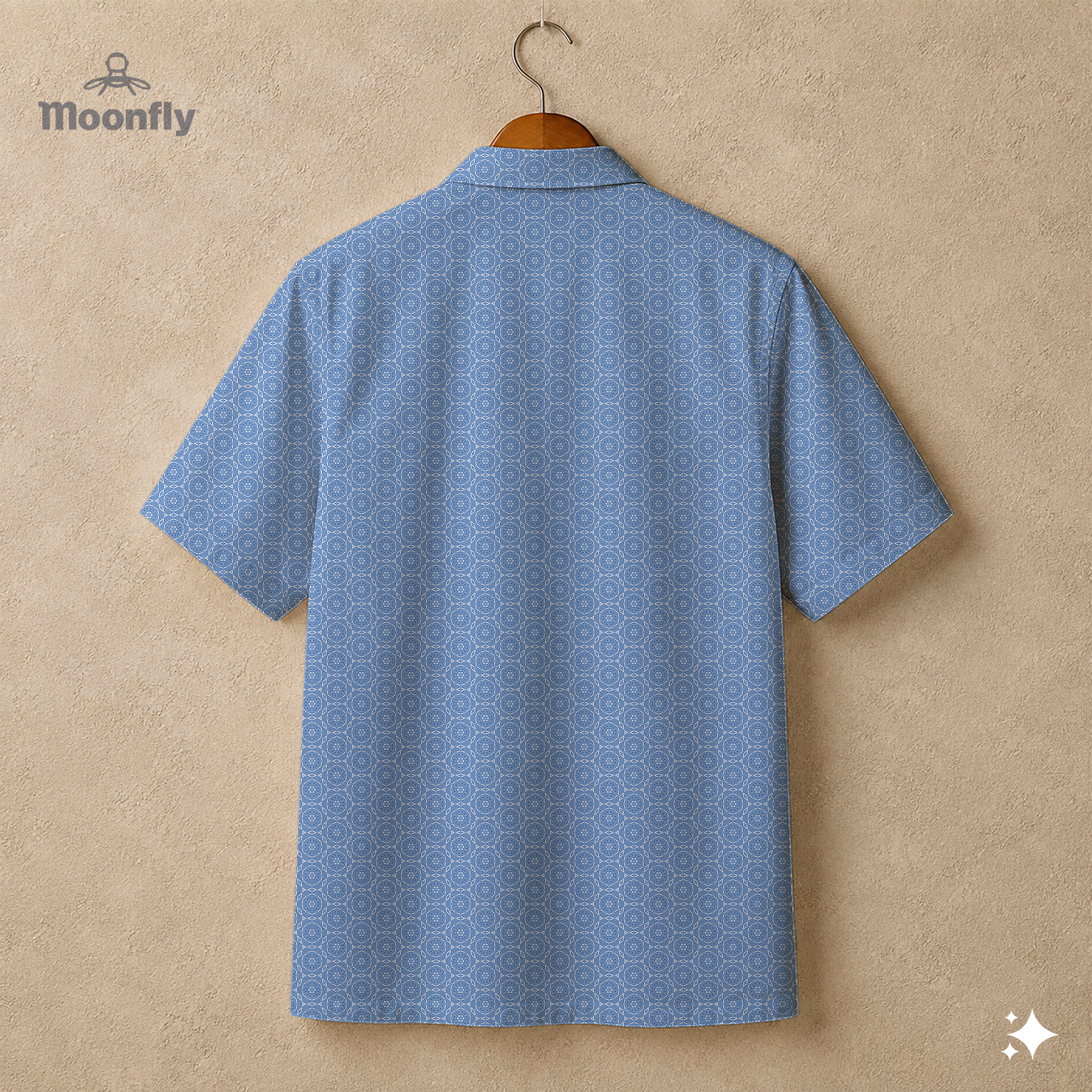 Back view of a  men’s geometric-pattern cotton Hawaiian short-sleeve button-down shirt in cream and blue. 
