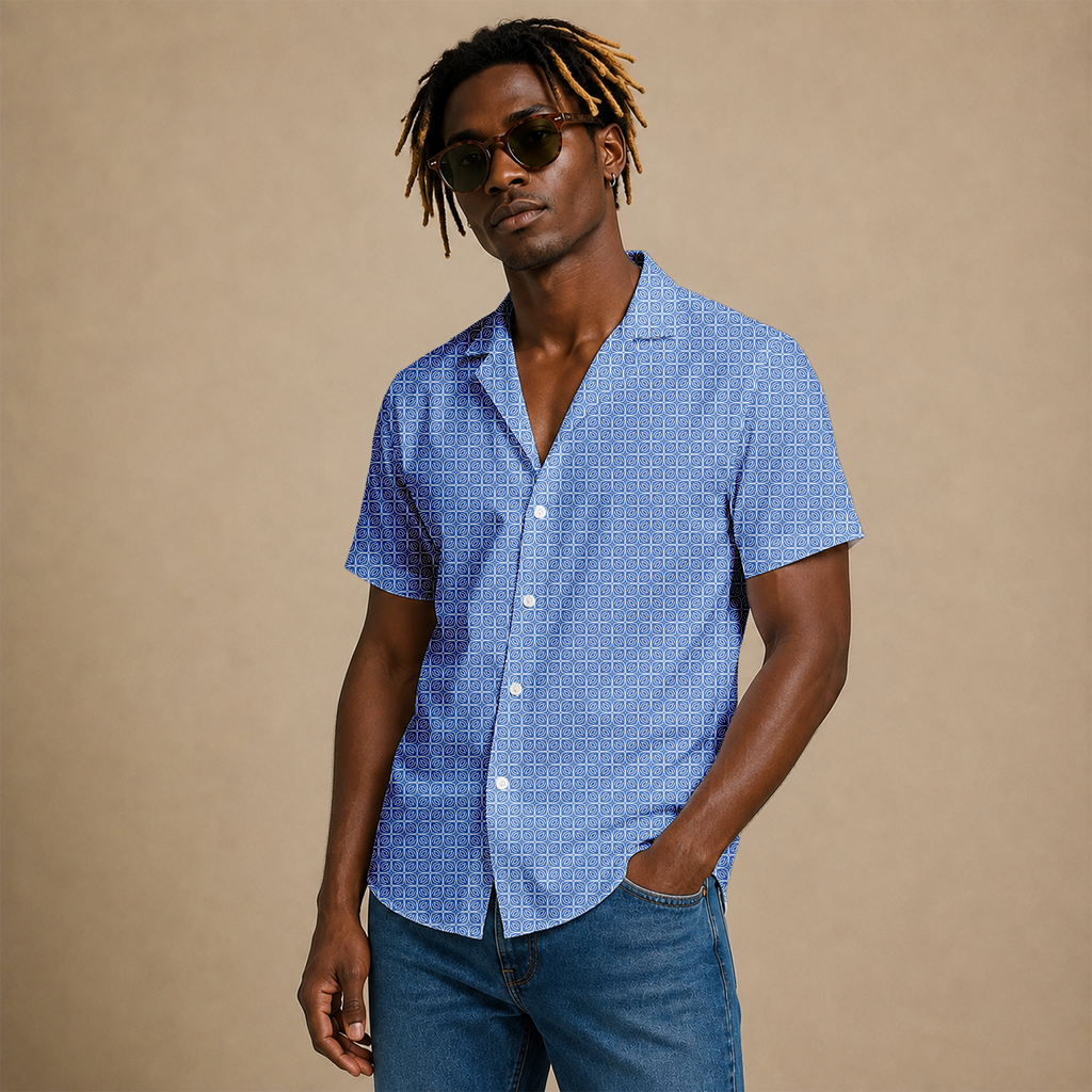 Men’s geometric-pattern cotton Hawaiian short-sleeve button-down shirt in cream and light blue.