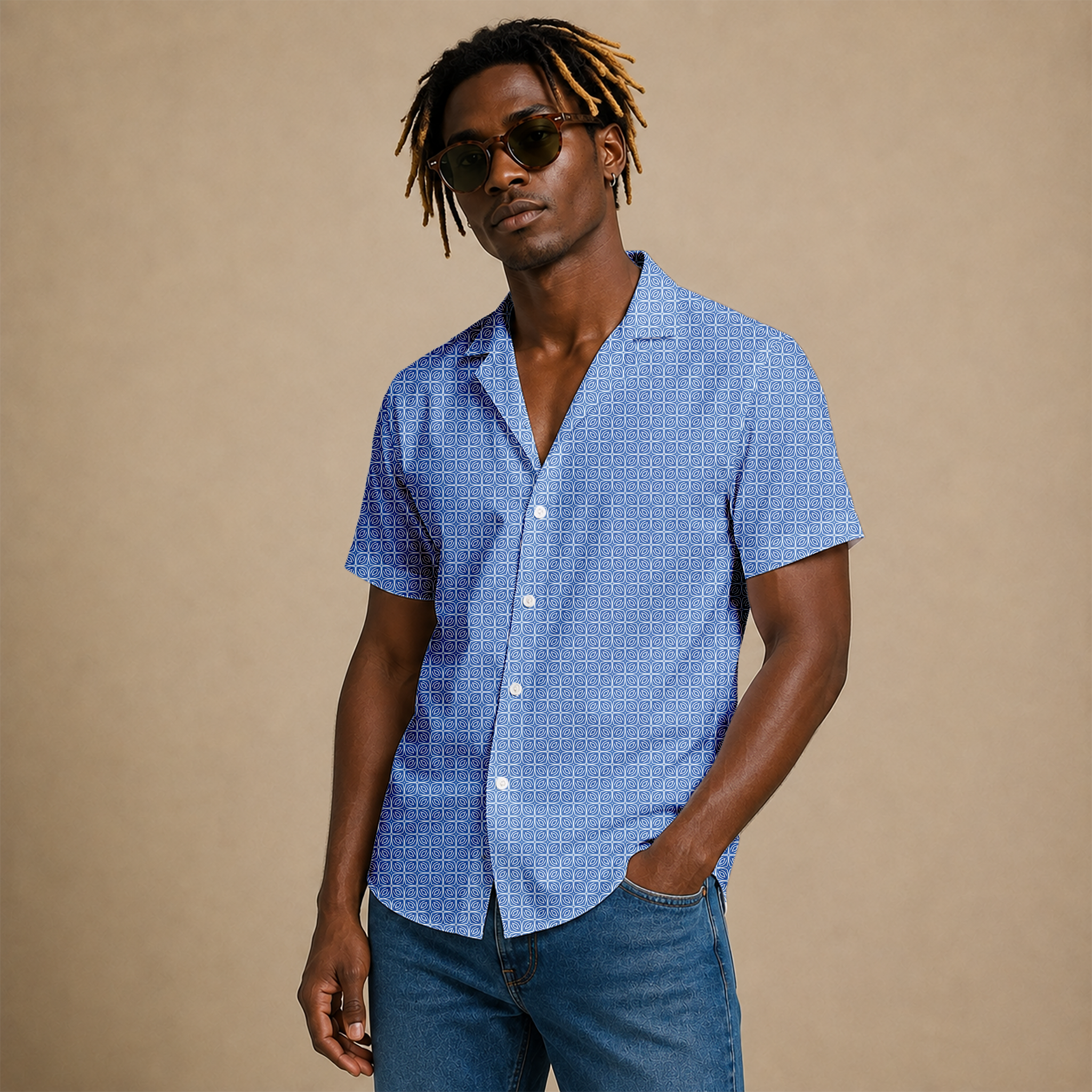 Men’s geometric-pattern cotton Hawaiian short-sleeve button-down shirt in cream and light blue.