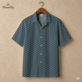 Men’s geometric-pattern cotton Hawaiian short-sleeve button-down shirt in black, blue, cream and brown.